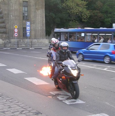 Motorcycle Driver Firing an Exhaust Flame.